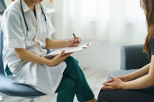The doctor is asking about the patient's history and Treatment details describe the effect of the disease and medication, side effect, medication, and way to take care of yourself.