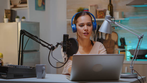 istock Content creator recording new podcast episode 1911415010