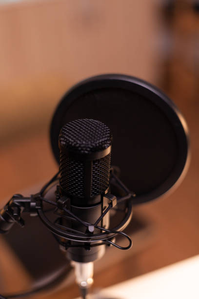 istock Close up of microphone at recording studio 1911420288