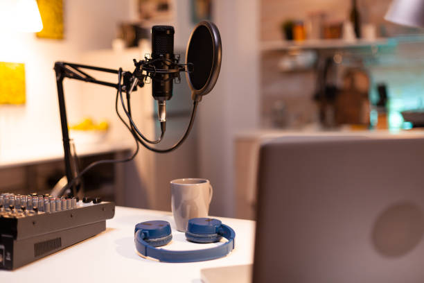 istock Online live podcast studio desk with microphone 1911430205