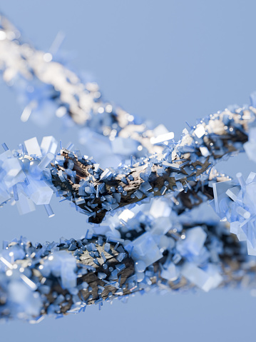 Blue crystals growing on a branch,