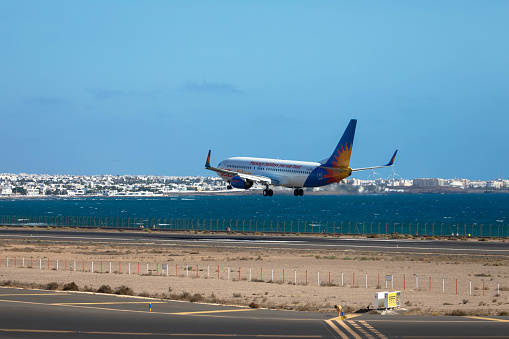 Airplane from Jet2holidays airlines on approach for landing. Blue sky. Airport César Manrique. November 09, 2023. Arrecife, Canary Island, Spain