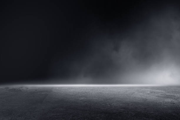 istock 3D Rendering abstract asphalt light in dark street and smoke on black background 1911497183