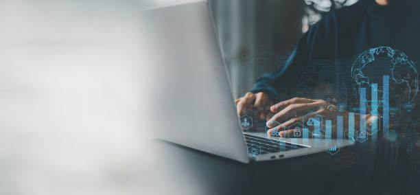istock Businesman using laptop for technology , global internet connection of business and digital marketing. Finance and Banking Digital Link Technology, Big Data, Investment concept . 1911505575