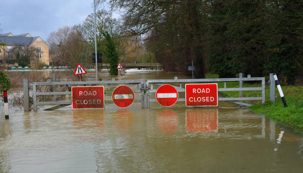 istock Flooding river Ouse causing bridge and road to be shut off. 1911512036