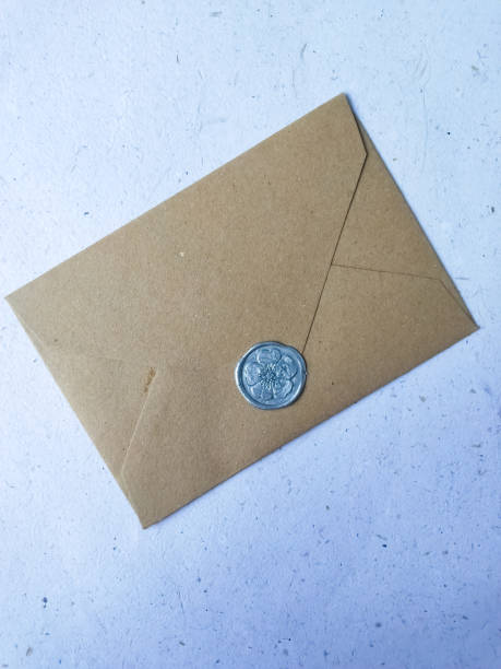 istock Envelope with wax seal on a white background, top view 1911513119