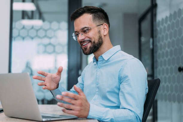 istock Businessman having video call in the office. 1911521710
