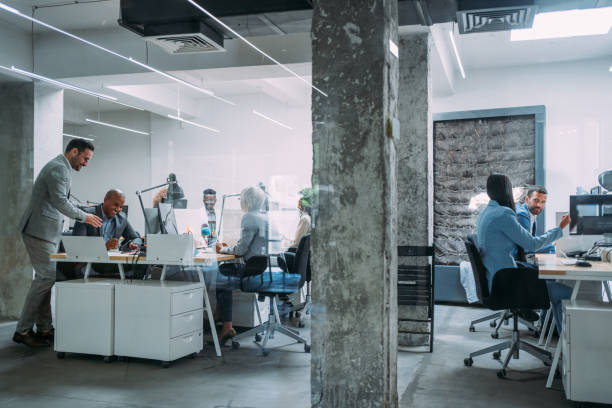istock Business people working at a modern office. 1911521765