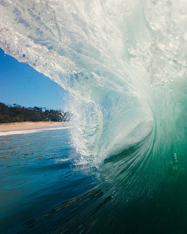 clear blue wave shot from the water on Australia's Sunshine Coast