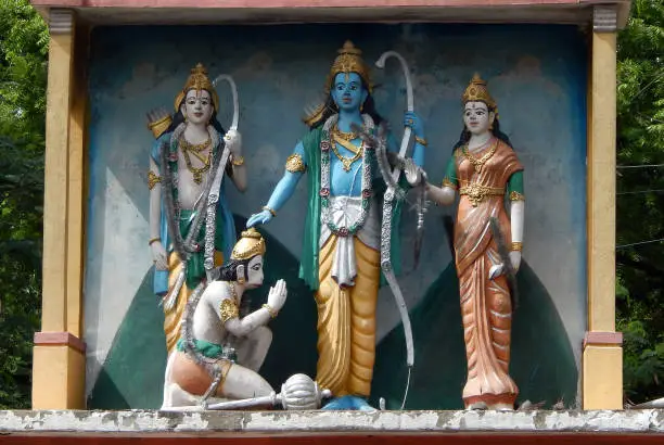 HYDERABAD,INDIA-JULY 23,2017: View of Indian God Rama blessing Hanuman and Goddess Sita,Lakshamana statues on a temple tower