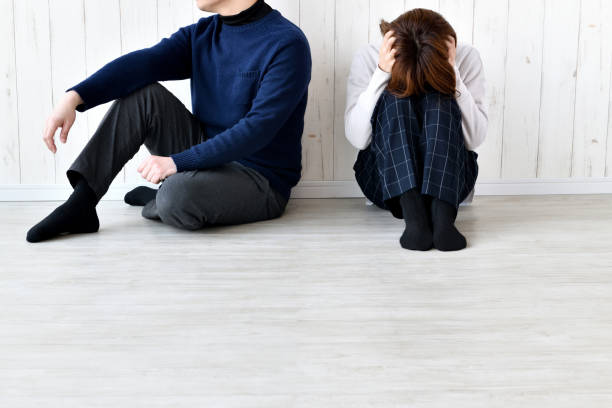 istock Sitting man and woman in trouble 1911602070