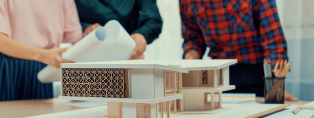 istock Engineer team meeting discussion and analysis house construction. Burgeoning. 1911602465