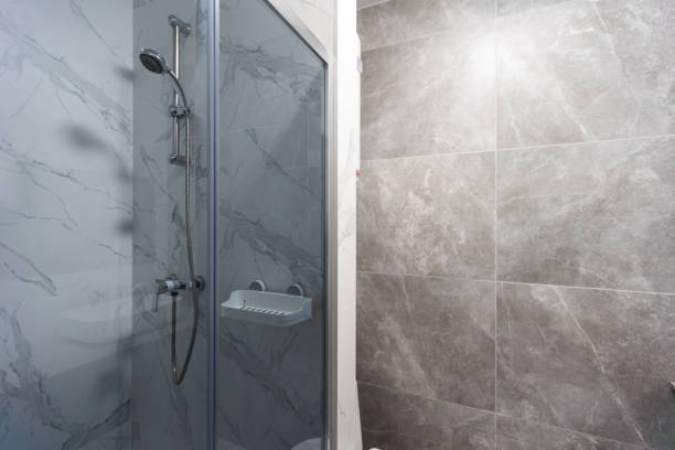 istock Shower and toilet bowl. Tight bathroom. 1911618091