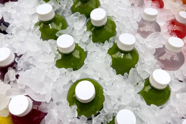 istock Cold-pressed fruit juice packed in bottles and soaked in ice. 1911675359