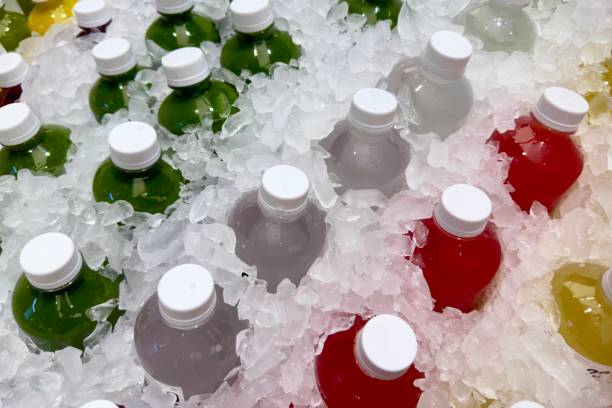 istock Cold-pressed fruit juice packed in bottles and soaked in ice. 1911678476
