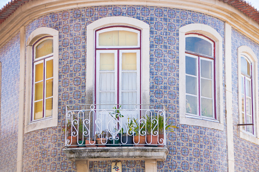 At Aveiro, Portugal, On 30-08-2023- beautiful window  of an historic building in Aveiro , decorated with azulejos tiles
