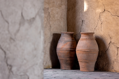 Two ceramic clay pots as part of UAE heritage. High quality photo.