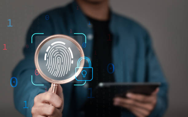istock cybersecurity concept, businessman using magnifying glass focus to fingerprint core and biometric authentication for cyber security and fingerprint password 1911743963