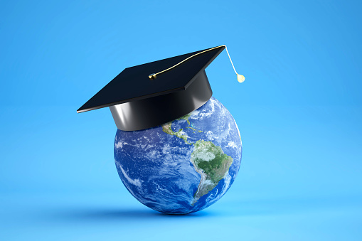concept of obtaining higher international education. globe in graduation cap on blue background. 3d render. illustration.