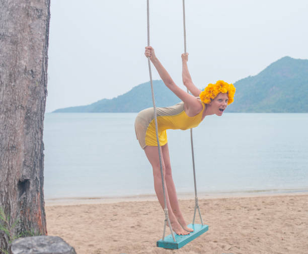 portrait of young woman in swing - bay wreath zdjęcia i obrazy z banku zdjęć