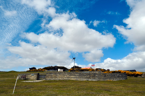 San Carlos, East Falkland, Falkland Islands: Blue Beach Military Cemetery British war cemetery, holding the remains of 14 of the 255 British casualties killed during the Falklands War in 1982, and one other killed in early 1984. It is situated close to where 3 Commando Brigade had its initial headquarters after landing on 21 May 1982.