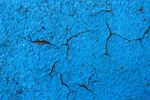 Cracked white wall texture background