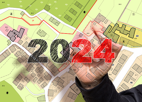 2024 Real Estate Planning - Business concept in building activity and construction industry with imaginary General Urban Plan, cadastral map and residential zoning districts