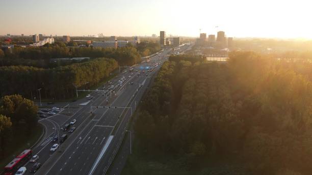 istock Amsterdan north intersection between N247 and the A10 Ringweg north, the highway where evening rush hour traffic stands on the highway. Commuters going home. 1911855110