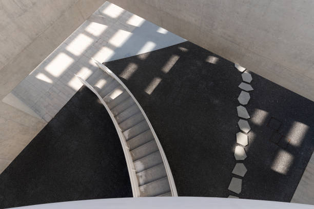 istock Undecorated cement walls and stairs in modern architecture 1911869251