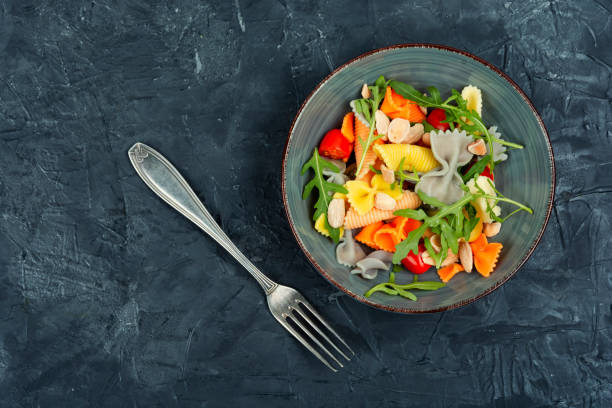 istock Vegetable salad with pasta, Mediterranean cuisine. 1911875027