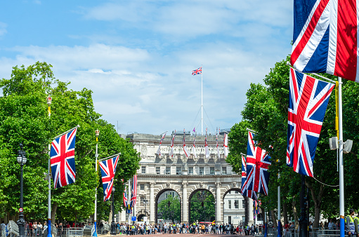 London, England - June, 3 , 2022:   Union Jack flags marking Queen Elizabeth II Platinum Jubilee view from The Mall.
