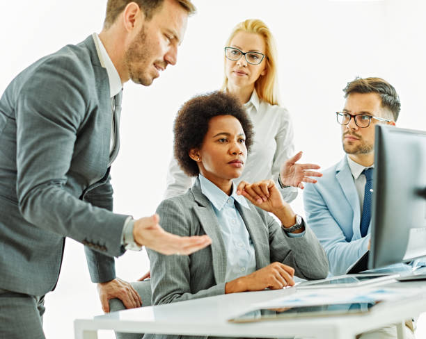 istock young business people meeting office teamwork group network wireless internet technology desktopplan class training computer together portrait startup student project 1912026639