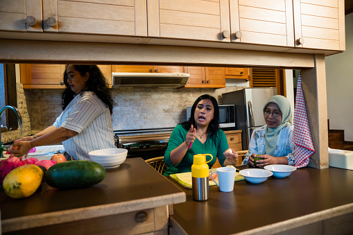 Group of Mature Women Preparing Meal Together
