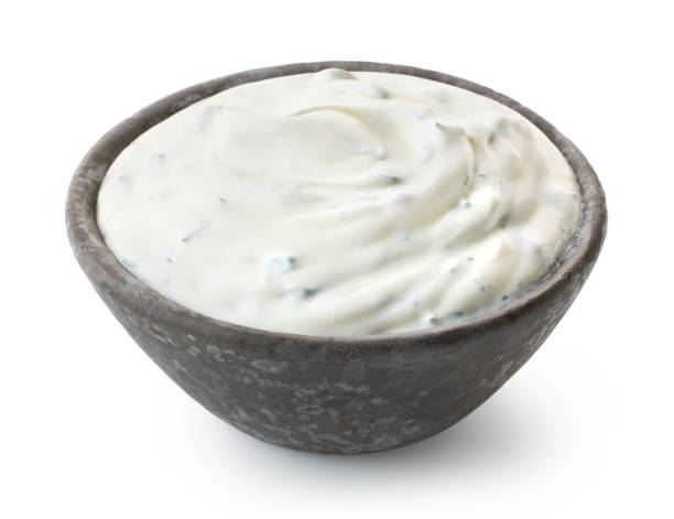 istock Dark grey ceramic bowl of fresh sour cream dip sauce with herbs 1912072396