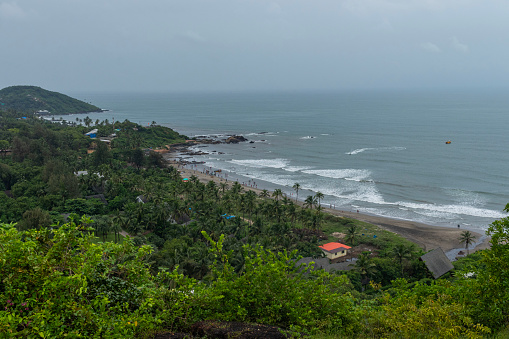 North Goa district is one of the two districts that constitutes the state of Goa, India. The district \nhas an area of 1,736 square kilometers (670 square miles), and is bounded by Kolhapur and Sindhudurg \ndistricts of Maharashtra state to the north and by Belgavi district of Karnataka to the east, \nby South Goa district to the south, and by the Arabian Sea to the west.