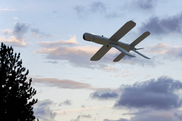 Bottom view of Russian military combat drone against clouds