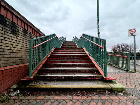 Low angled view on a staircase onto a bridge