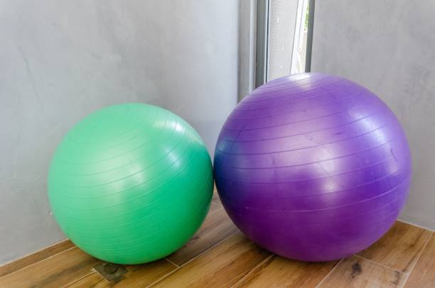 istock two gym balls are next to each other on the floor 1912110372