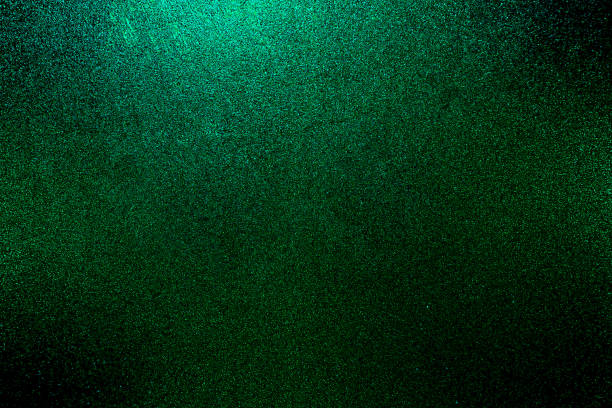 istock green black glitter texture abstract banner background with space. Twinkling glow stars effect. Like outer space, night sky, universe. Rusty, rough surface, grain. 1912122992