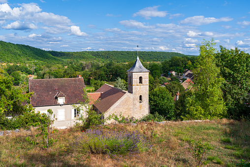 overlooking chevroches commune or town with church and village hall in foreground of nievre department france