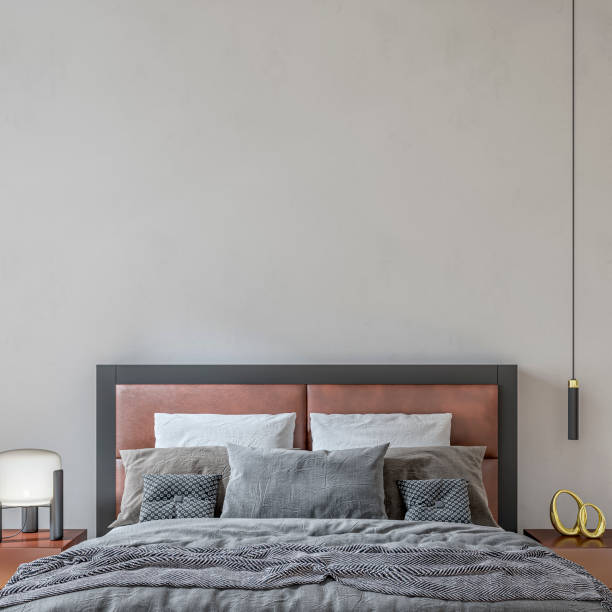 istock Front view of a luxury bedroom with  leather double bed and decoration 1912185519