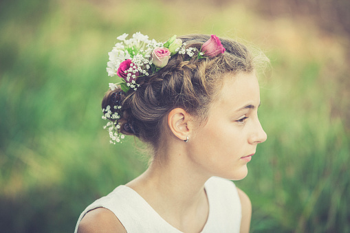 girl with flowers in the hair.