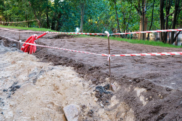istock Construction site is fenced with red and white warning tape 1912296115