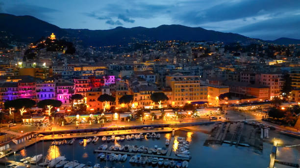 aerial view of sanremo at night, italy. port and city buildings - san remo zdjęcia i obrazy z banku zdjęć