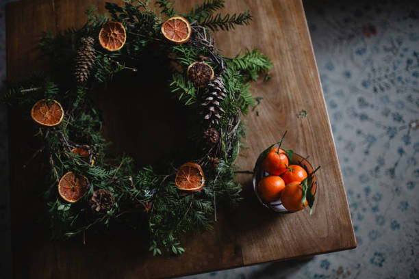 Tangerine and a Christmas wreath