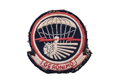 Saint Mere Eglise, France – October 14, 2023: US WWII 501st Parachute Infantry Regiment Shoulder Patch - Geronimo on White Background