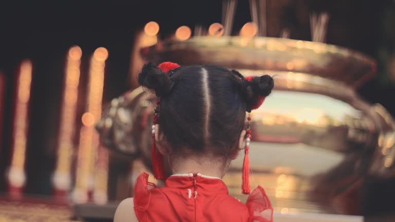 Chinese New Year  / A girl praying