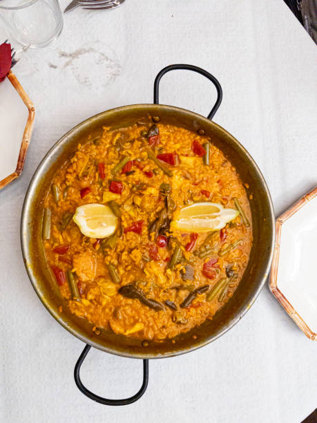 istock Freshly prepared dish of Paella 1912441084