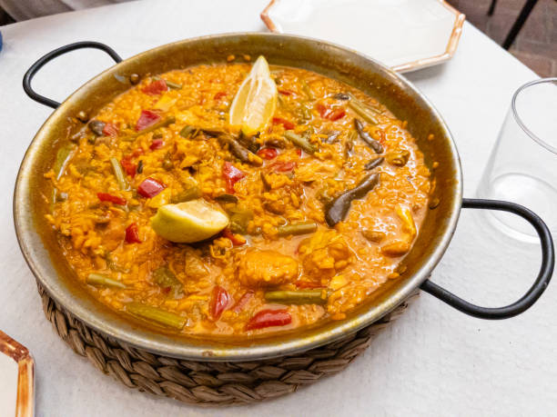 istock Freshly prepared dish of Paella 1912441587