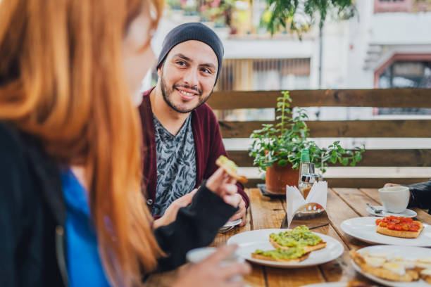 istock Friends having breakfast in the city 1912465787